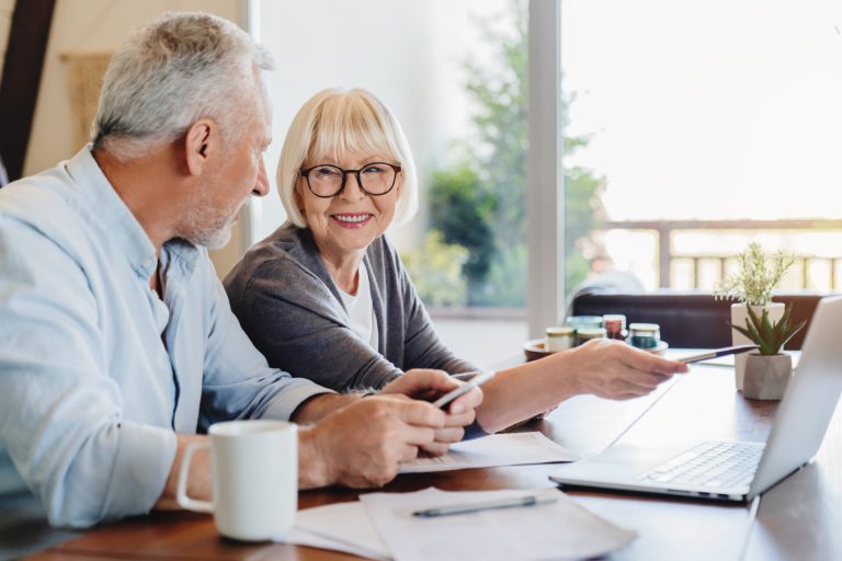 Older Couple Sitting at Table